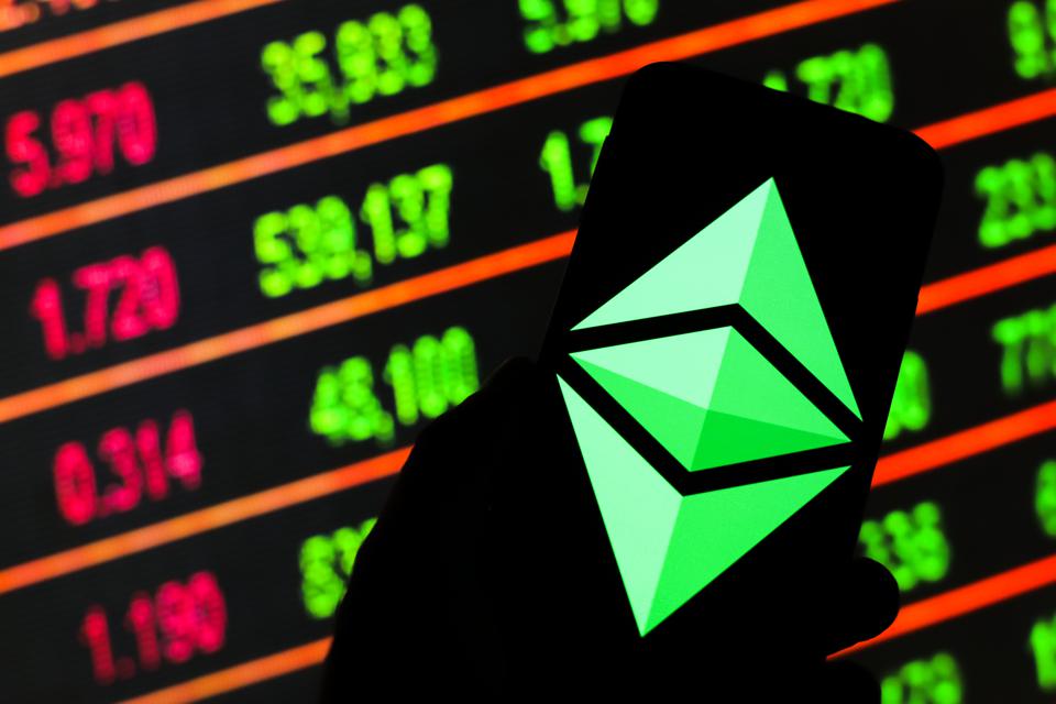 In this photo illustration an Ethereum, cryptocurrency logo...