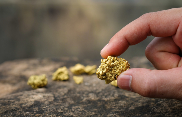 Holding Gold Nugget.jpg